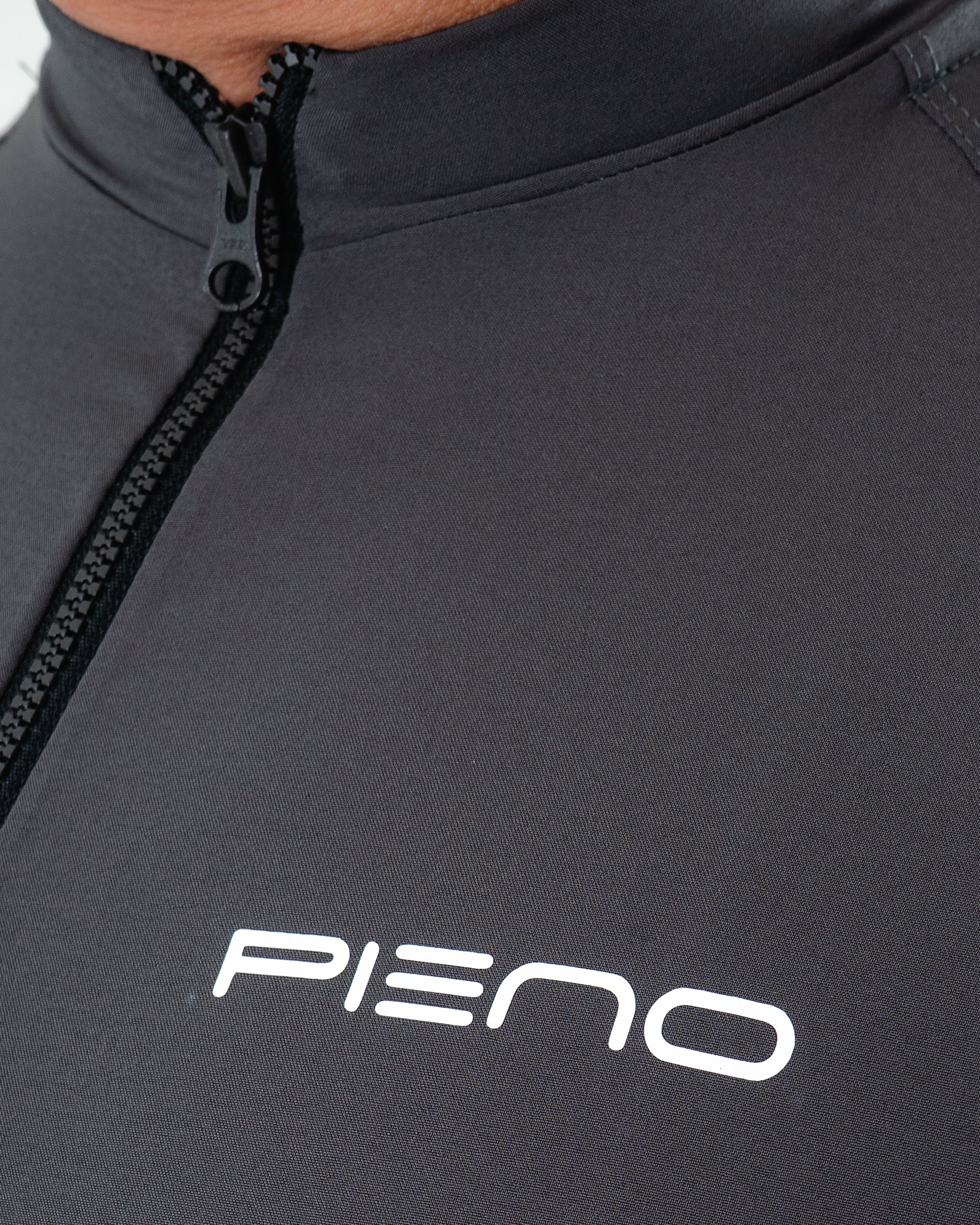 CHAQUETA IMPERMEABLE REPELENTE A EL AGUA UNISEX PIENO
